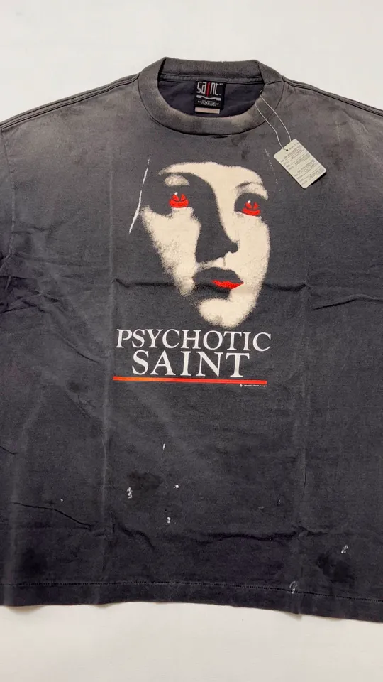 SAINT Mxxxxxx SS TEE/PSYCHOTIC SNT/BLK Gothic heavy metal rock style retro short-sleeved Mysterious woman's face printed distressed TEE Washed black S-XL Same as the original version Cylindrical side seam OE yarn fabric Garment dyeing Faded by heavy washing Bust plaster faded Correct version Matching of original accessories